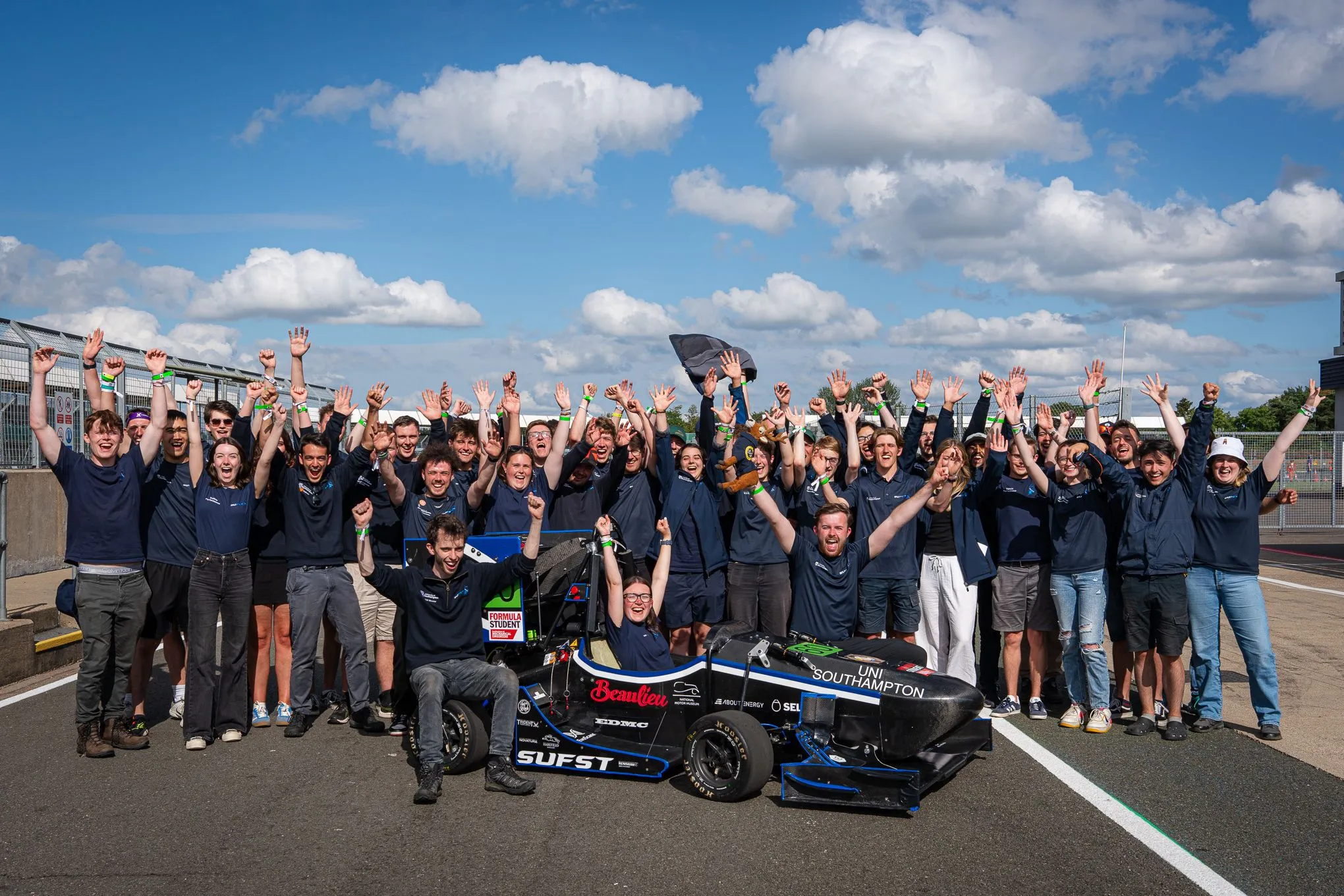 Southampton University Formula Student Team, group photo with the car